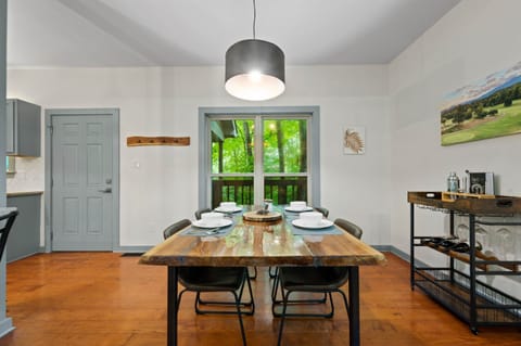 Enjoy family dinners around our live edge dining table while viewing the surrounding forest!