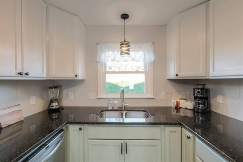 Ground local coffee, tea & raw sugar are provided. A drip coffee maker, with reusable filter & a french press are available. 