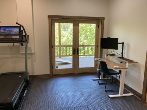 Workout room; adjustable standing desk