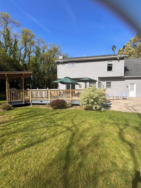Large deck with plenty of seating.
Grilling area with awning.