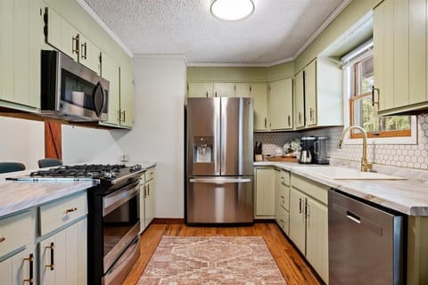 The fully stocked kitchen has lots of space to cook a family meal.
