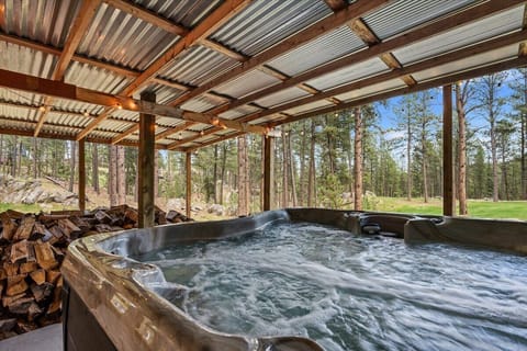 Unwind in your own private mountain oasis with our steaming hot tub.