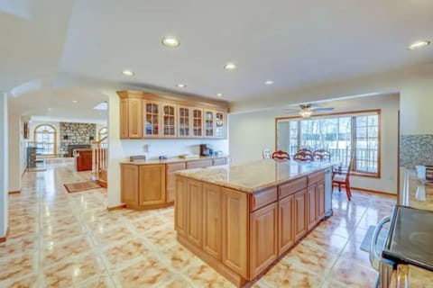 Fully stocked kitchen with dining area