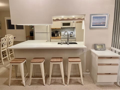 New countertop, workstation sink, touch faucet & dishwasher.