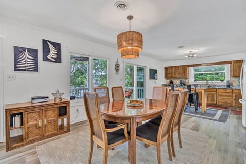 Savor your meals in a bright dining area with a view and ample seating for everyone.