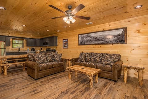 An inviting open-concept living and dining area, ideal for relaxation and family gatherings.