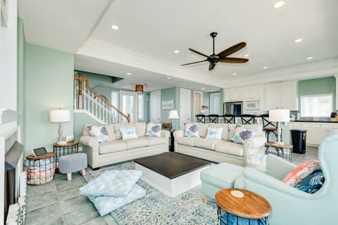 Bright and airy living area with cool coastal color palette