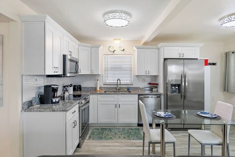 Full size side by side refrigerator with ice maker and water in the door.