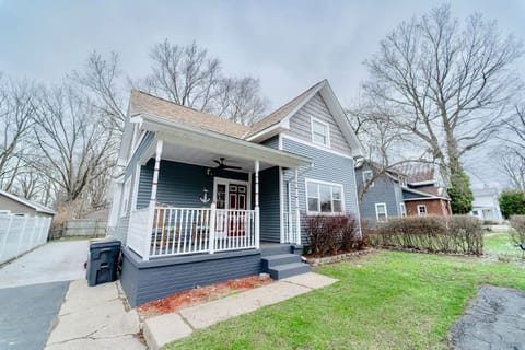Spacious porch with two rocking chairs.