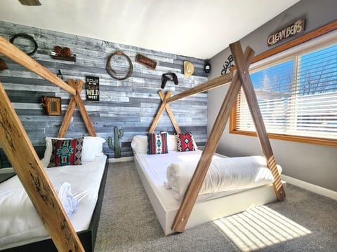 Kid's room with Tipi beds (1 twin & 1 full.)