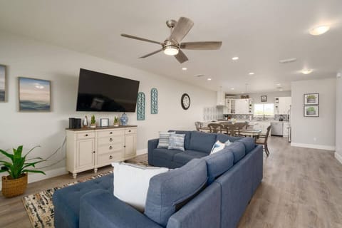 Open-concept coastal living — comfy lounge space perfect for family movie nights after a day at the beach.
