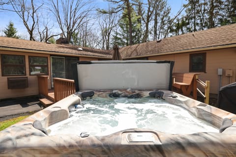 Nested in the rear crook of the house is this fabulous 6 person hot tub!
