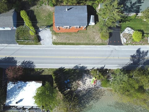 EXTERIOR:  An aerial photo from directly above the private beach.