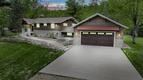 Scenic exterior with attached garage.