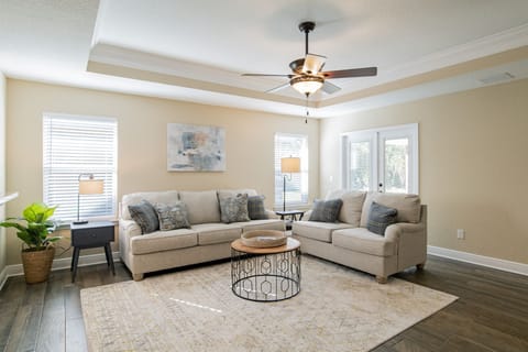 Unwind in the private Living Room, a cozy sanctuary for relaxation and quality time.