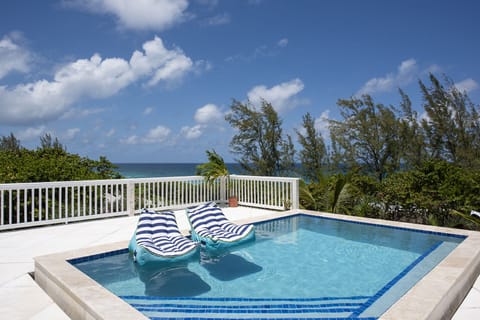 Come and Go Villa's ocean-view infinity pool with sweeping views of the Atlantic Ocean.  Come and Go Beach is steps from the house.