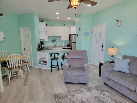 Living room, dining area and kitchen.