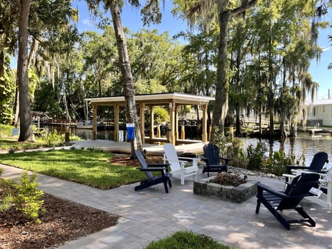 Back Yard View of Fire Pit and Boat Dock