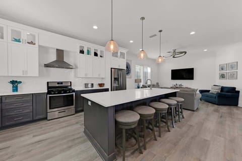 This Huge Kitchen Island Is Perfect For Gathering the Whole Family.