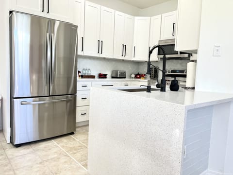 The kitchen is fully stocked with  serving dishes and everything you'd need.