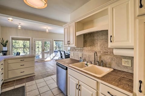 Chef's Kitchen w/ pots, pans, baking dishes, utensils, spices, & oils. 