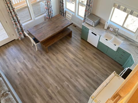 View of kitchen and dining from the loft