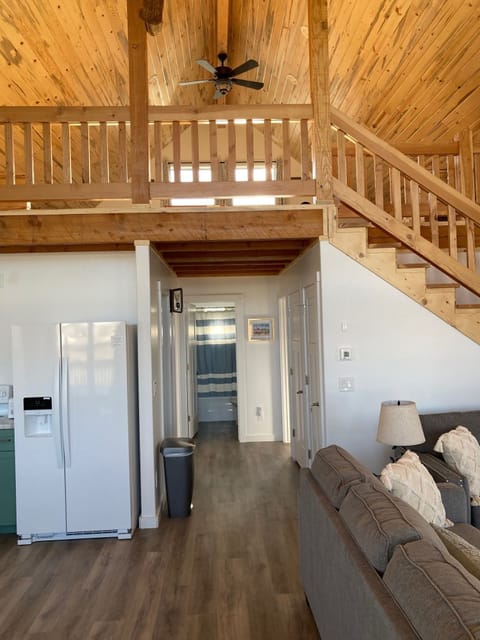 View of the hallway and loft coming in the front door