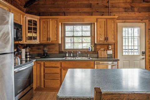 Kitchen comes stocked with pots & pans, glasses, dishes, utensils, stainless steel appliances. 