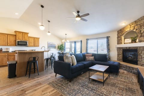 Great room opens to the living, dining room and kitchen.