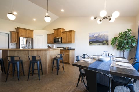 Dining and kitchen with island. 