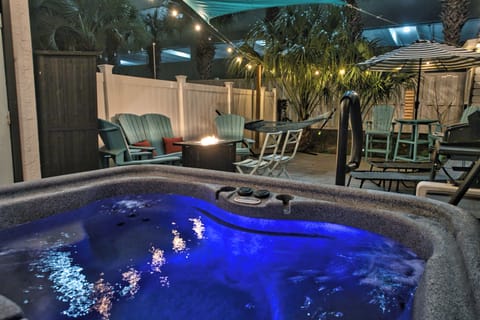 At night enjoy the patio lights, hot tub, fire table, and roasting marshallows