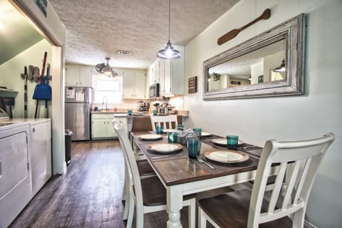 Table seats 6 with a bench on the back side and 2 at the bar