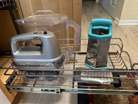 Graters, 1 gallon pitcher, and hand mixer.