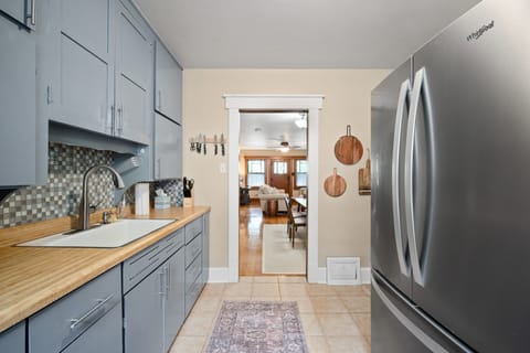 Kitchen is stocked with dishes and utensil to enjoy a home cooked meal!