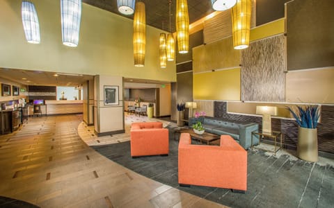 Arrive and unwind beneath warm lighting in the inviting lobby.