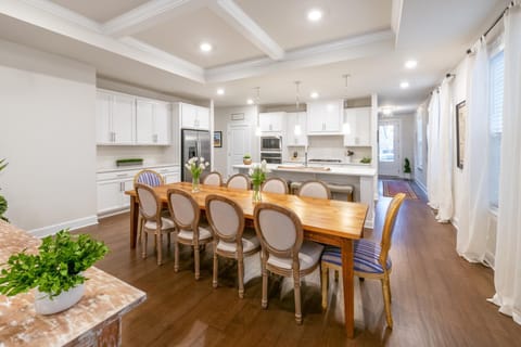 The dining room area is located directly off of the kitchen and has seating for 10.