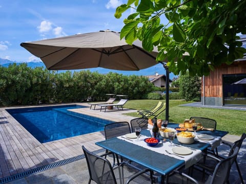 Table, Plant, Furniture, Cloud, Sky, Water, Swimming Pool, Building, Chair, Umbrella