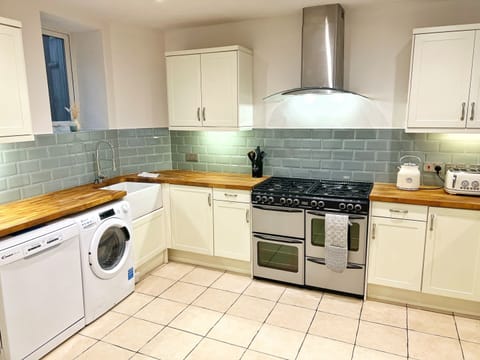 The Kitchen - with double oven, dishwasher, washing machine and kitchen essentials
