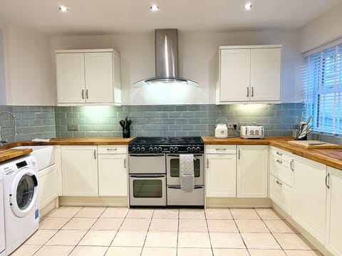 The Kitchen - with double oven, dishwasher, washing machine and kitchen essentials