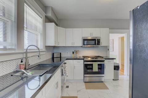 fully stocked kitchen w/ all new stainless steel appliances and espresso machine