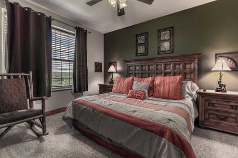 Our master suite with a king-sized bed and rocking chair set right in the mountains!