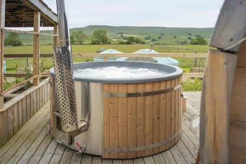 Private hot tub with each yurt