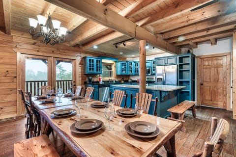 The large indoor dining table sits up to 10 guests.