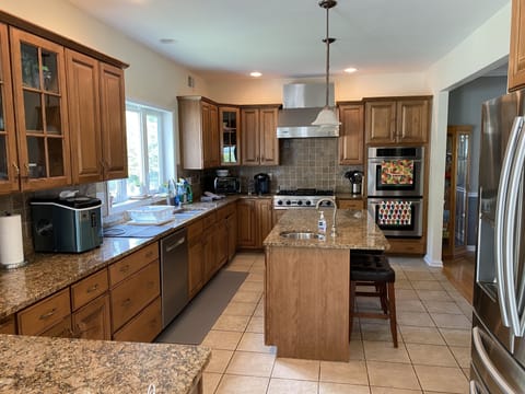 Gourmet kitchen with two sinks, two ovens, ice maker and more!