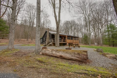 Picnic and fire pit area outside - great for family nights spent at the cabin!