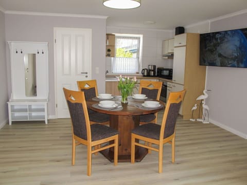 Water, Table, Tableware, Property, Sky, Furniture, Building, Window, Blue, Chair