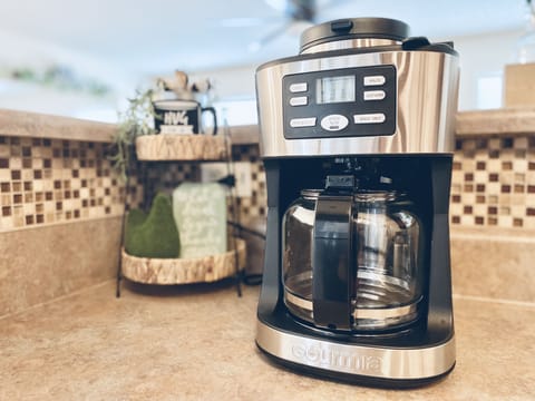 Good morning sunshine! Coffee maker and complementary coffee bar.