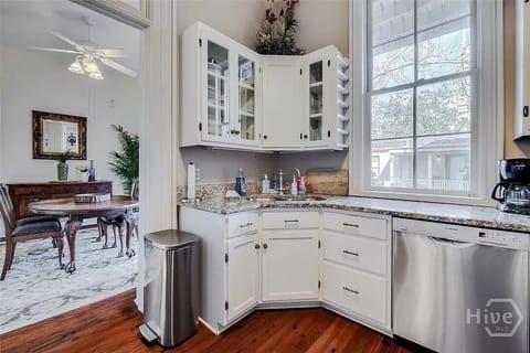 Kitchen opens to breakfast room overlooking the courtyard