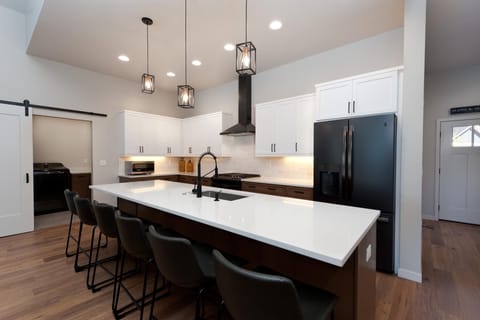 Kitchen fully stocked with cookware and bakeware.