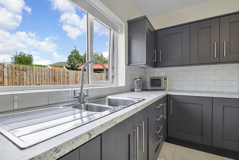 Kitchen with backyard view